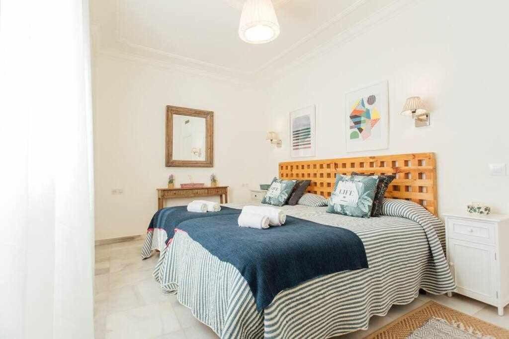 Posteľ alebo postele v izbe v ubytovaní Apartamento Boutique Abades