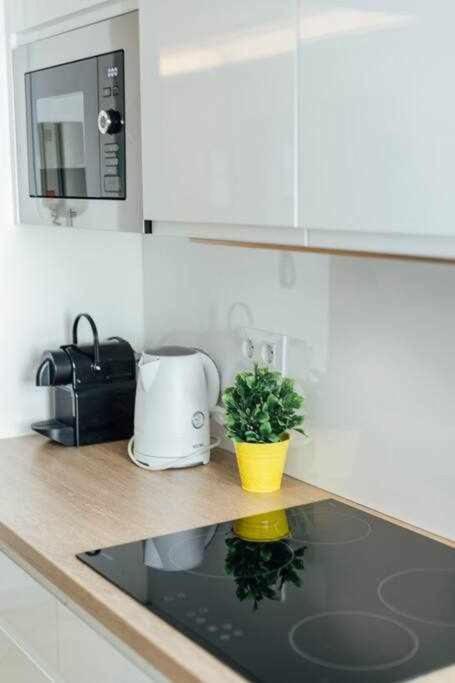 Kuchyňa alebo kuchynka v ubytovaní Apartamento Boutique Abades