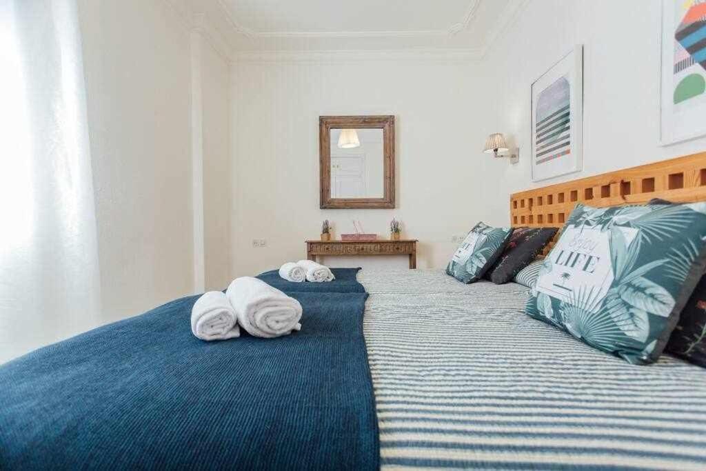 Posteľ alebo postele v izbe v ubytovaní Apartamento Boutique Abades