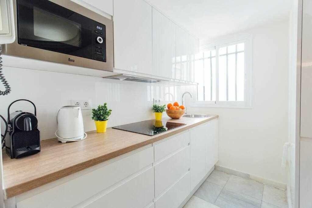 Kuchyňa alebo kuchynka v ubytovaní Apartamento Boutique Abades