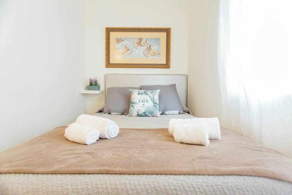 Posteľ alebo postele v izbe v ubytovaní Apartamento Boutique Abades