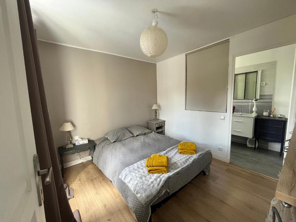 Posteľ alebo postele v izbe v ubytovaní Le 33 Maison de charme coeur Cotentin