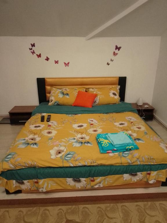 Postel nebo postele na pokoji v ubytování Casa Mocanu