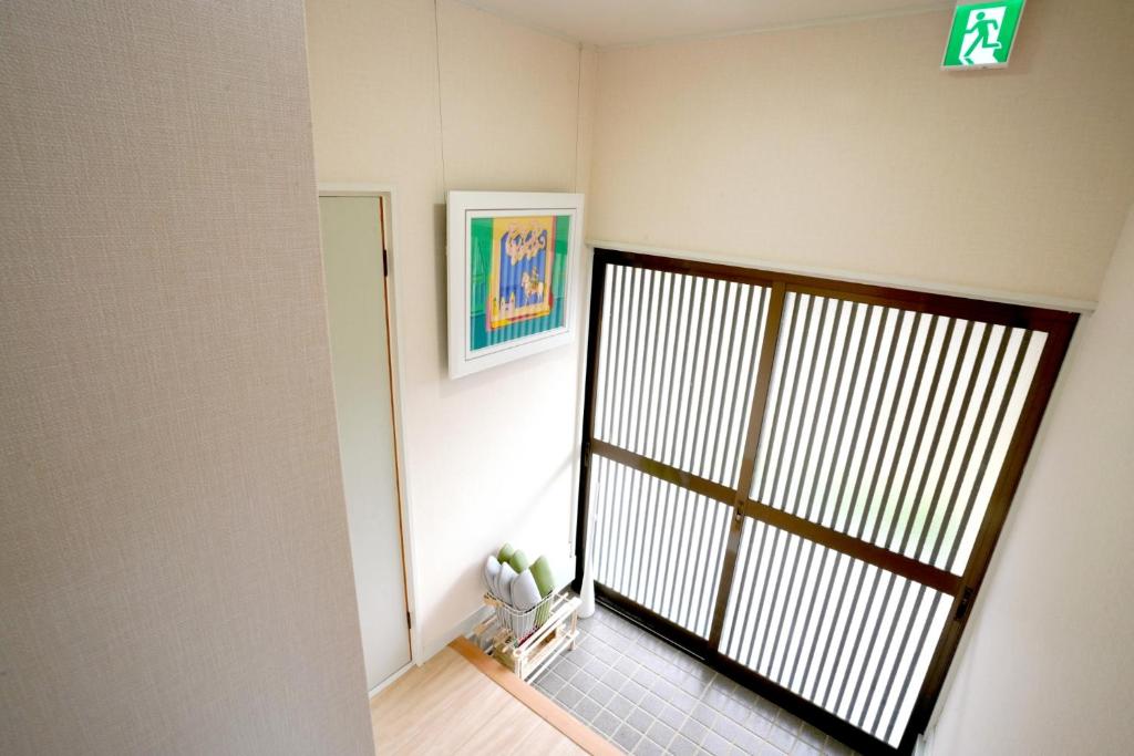 Postel nebo postele na pokoji v ubytování ヒュッテ・ボーデン