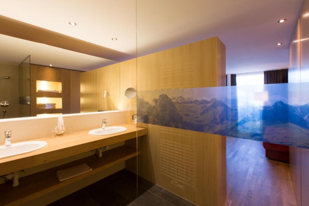 Koupelna v ubytování Almhotel Hochhäderich