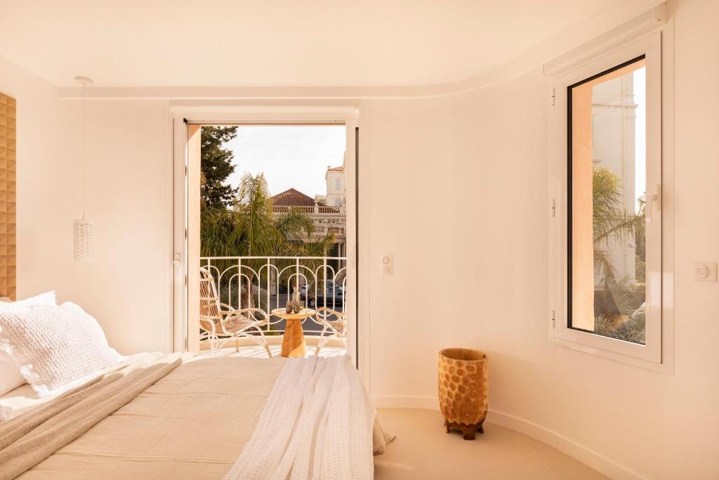 Postel nebo postele na pokoji v ubytování Maison Carla Rosa Cannes