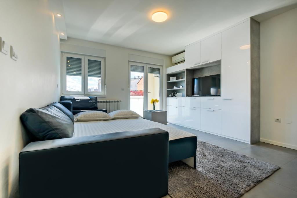 Posteľ alebo postele v izbe v ubytovaní Apartment Zagreb, 0-24, self service check-in, free parking