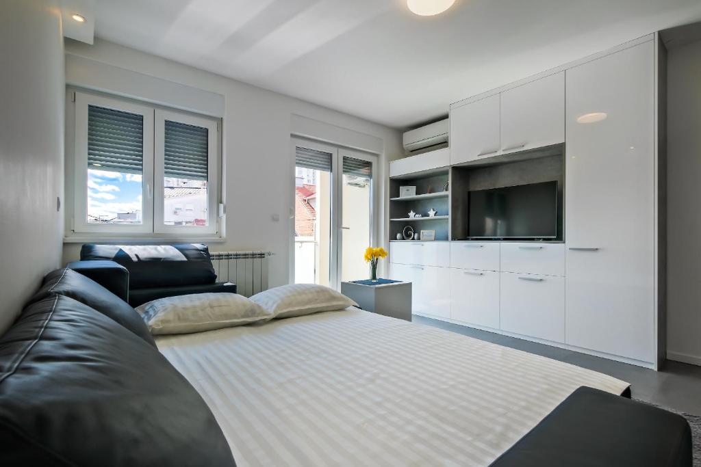Posteľ alebo postele v izbe v ubytovaní Apartment Zagreb, 0-24, self service check-in, free parking