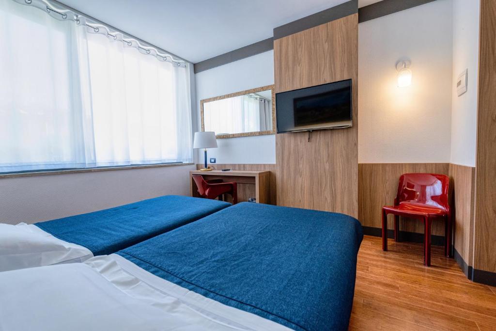 Posteľ alebo postele v izbe v ubytovaní Colleverde Park Hotel