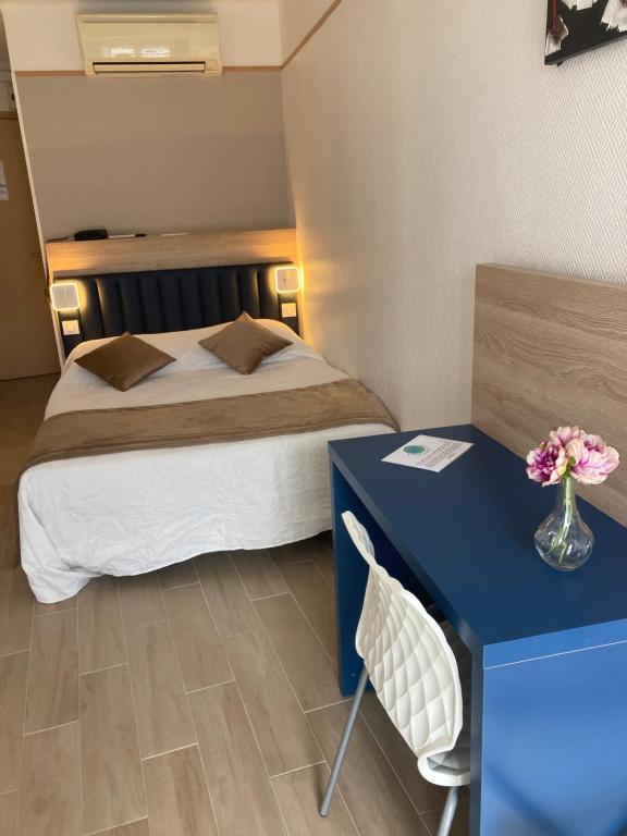 Postel nebo postele na pokoji v ubytování Hotel Le Golfe