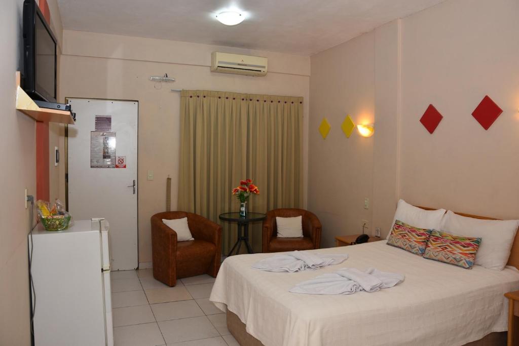 Postel nebo postele na pokoji v ubytování Arthur Palace Hotel