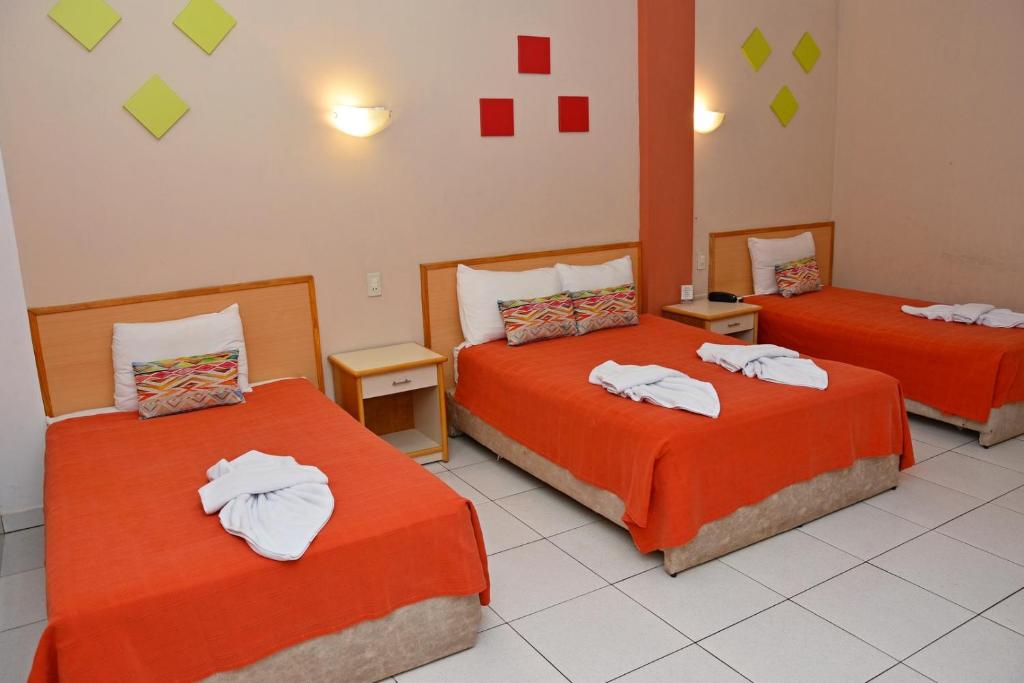 Postel nebo postele na pokoji v ubytování Arthur Palace Hotel