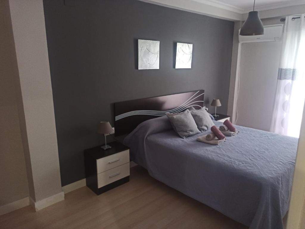 Posteľ alebo postele v izbe v ubytovaní Apartamento con parking privado gratis incluido