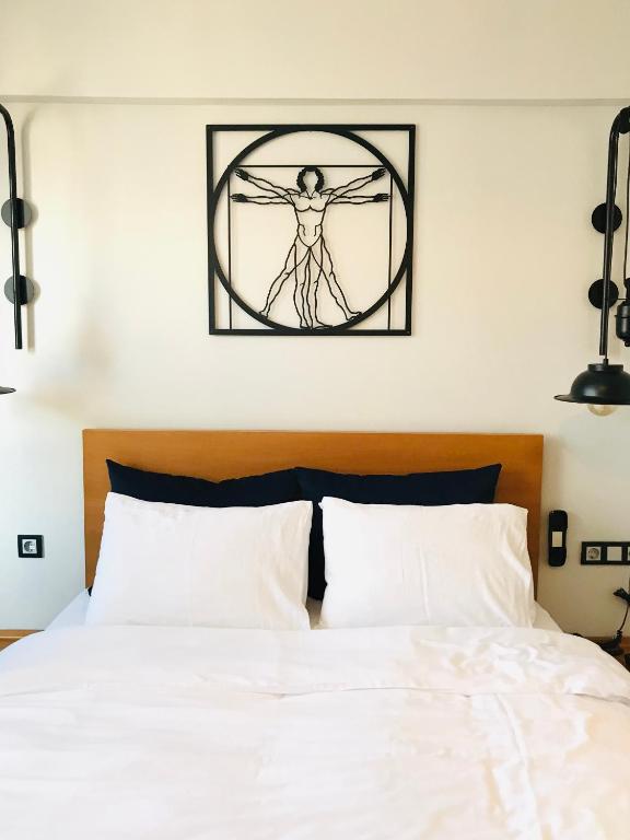a bedroom with a bed with a window above it at Barkod Otel in Istanbul