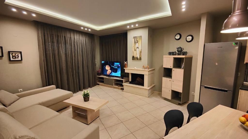 TV a/nebo společenská místnost v ubytování Toroni Pearl