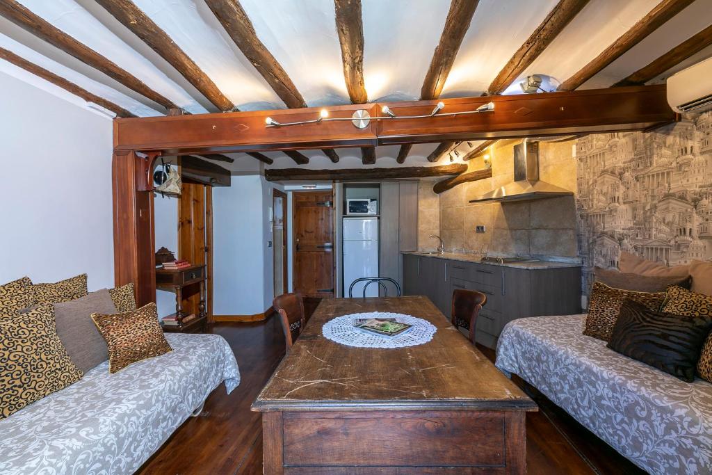Posezení v ubytování Apartamentos Vino Tinto y Restaurante Tomate Rosa