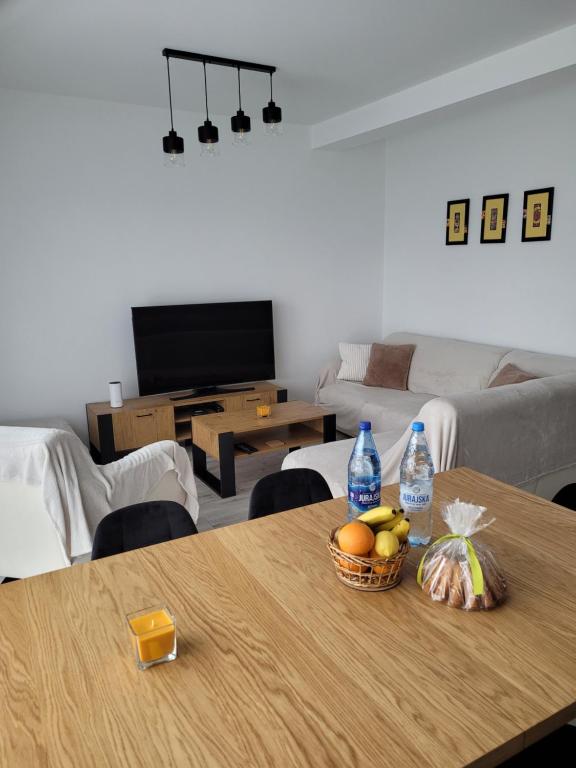 TV a/nebo společenská místnost v ubytování Leszka Loft Apartment