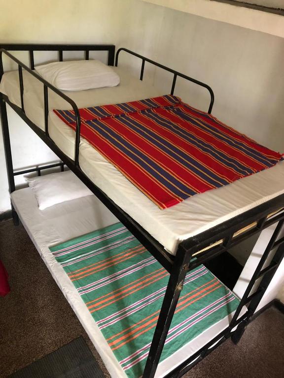 Postel nebo postele na pokoji v ubytování Drop Hostel