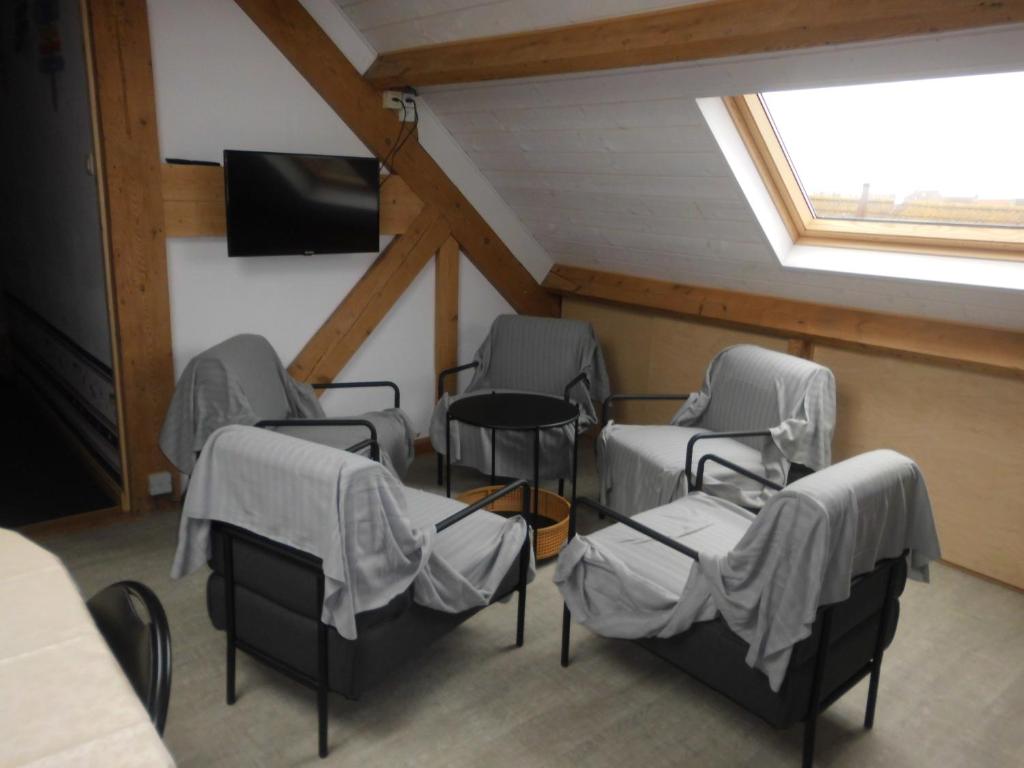 TV a/nebo společenská místnost v ubytování Logies 't Eenvoud (rooms)