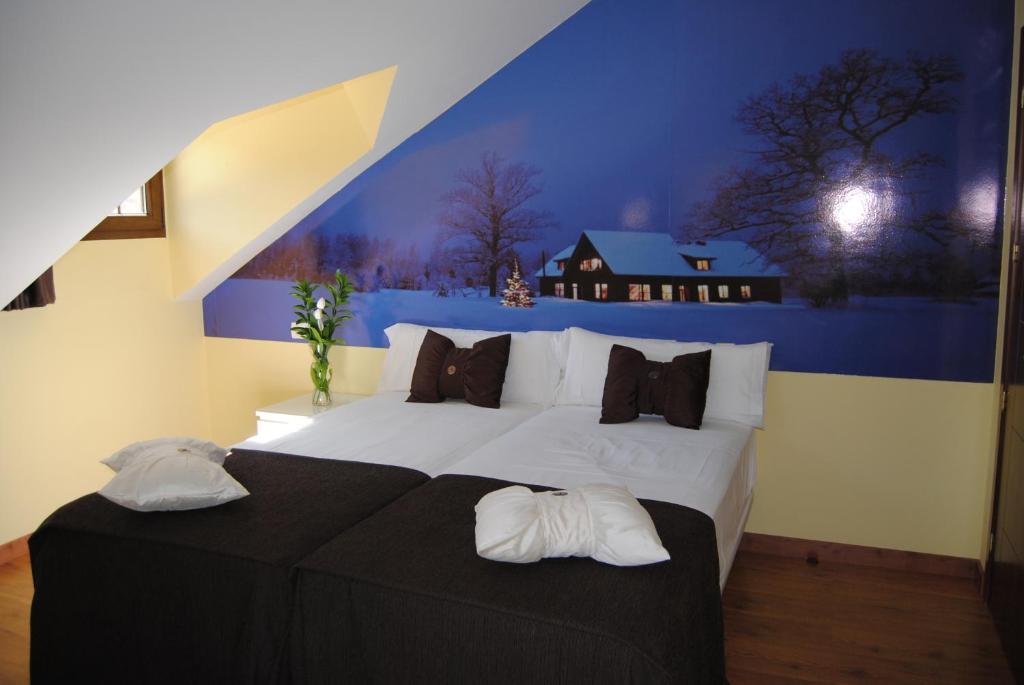 Postel nebo postele na pokoji v ubytování The Way Hotel Molinaseca
