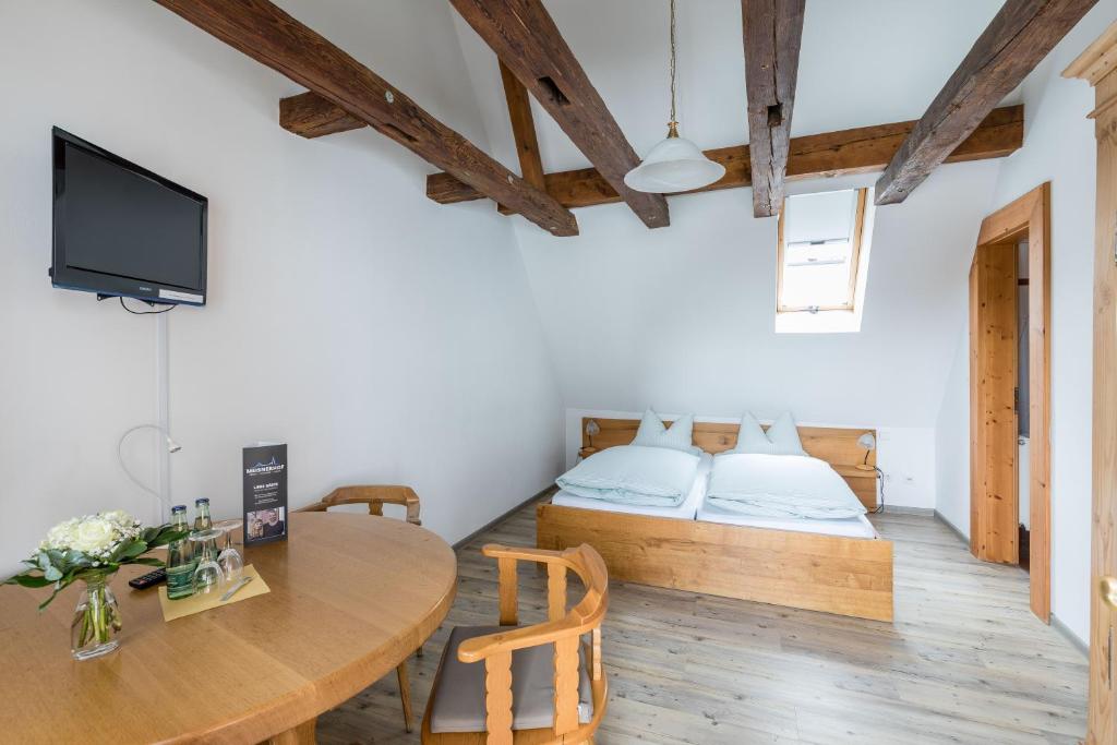 Postel nebo postele na pokoji v ubytování Hotel Meisnerhof