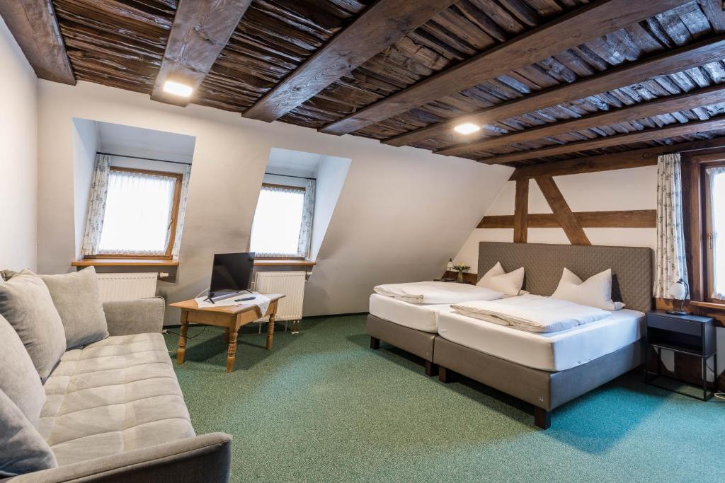 Postel nebo postele na pokoji v ubytování Hotel Meisnerhof