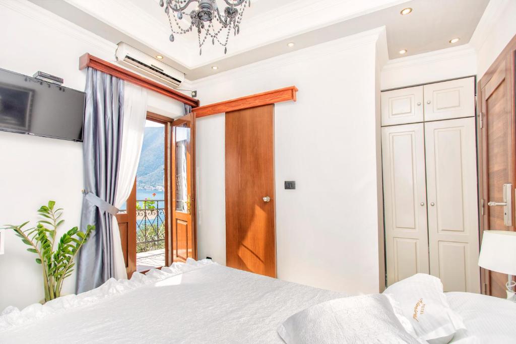 Krevet ili kreveti u jedinici u objektu Hotel Admiral
