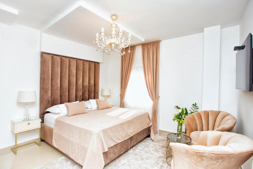 Krevet ili kreveti u jedinici u objektu Hotel Admiral
