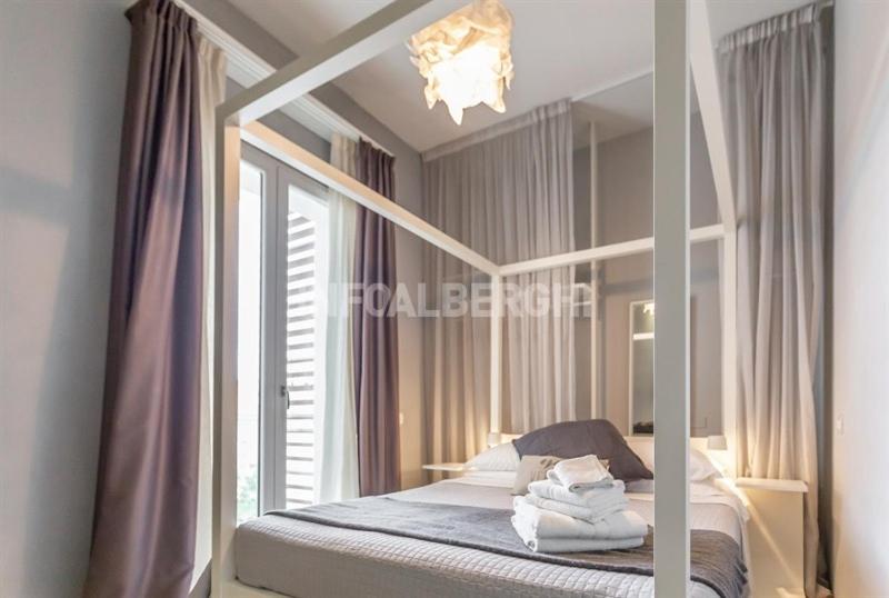 Postel nebo postele na pokoji v ubytování Albergo Aquila