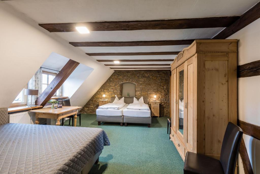 Postel nebo postele na pokoji v ubytování Hotel Meisnerhof