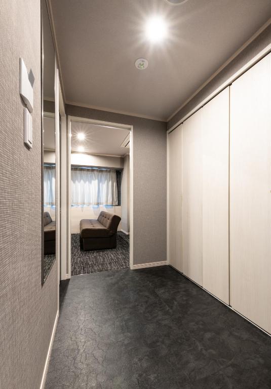 Postel nebo postele na pokoji v ubytování Hotel Legit