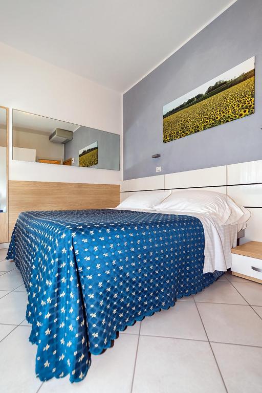 Postel nebo postele na pokoji v ubytování Hotel Baya - in centro, sul mare