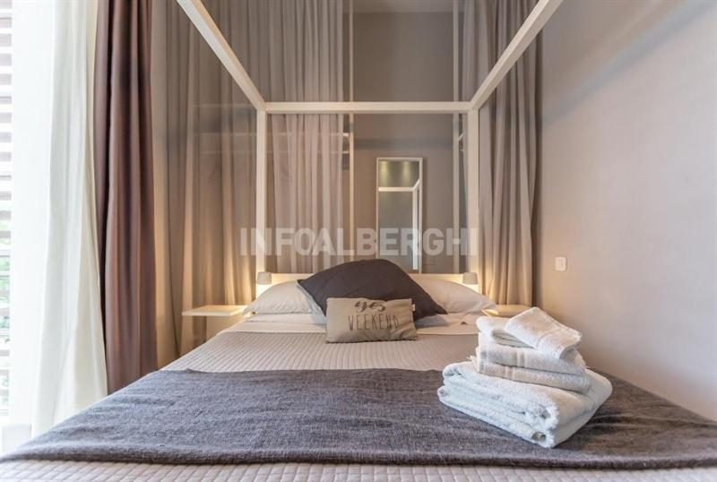 Postel nebo postele na pokoji v ubytování Albergo Aquila