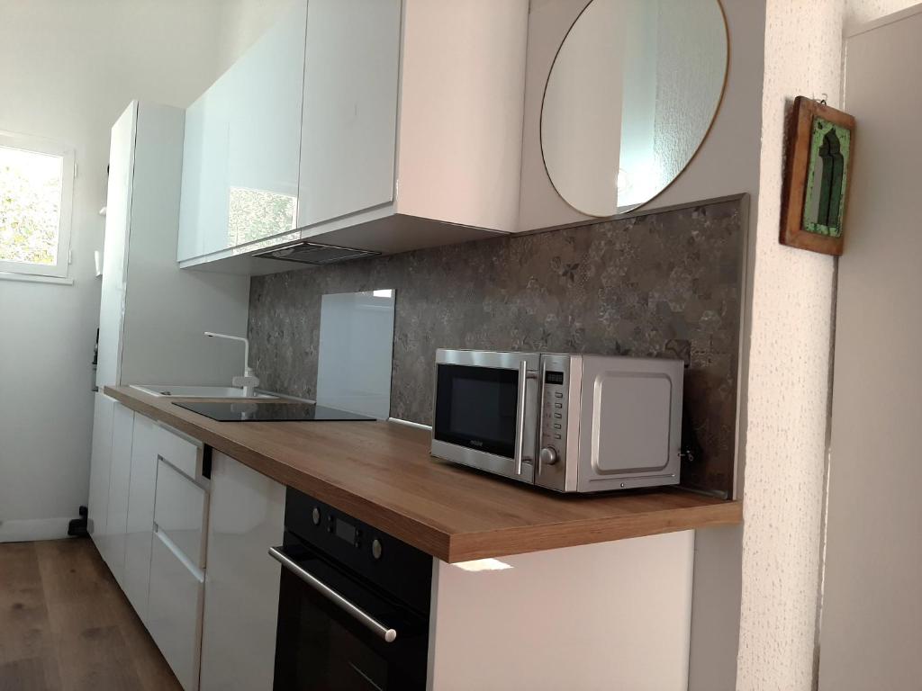 Kuchyňa alebo kuchynka v ubytovaní Piccula Casa