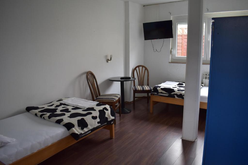 Postel nebo postele na pokoji v ubytování Favela Hostel