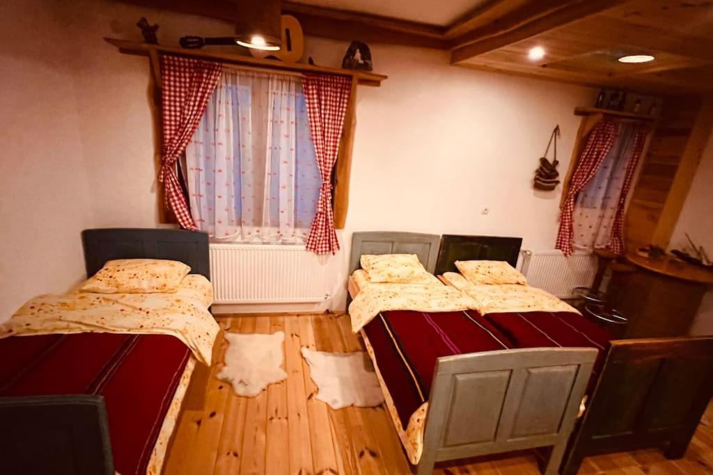 Voodi või voodid majutusasutuse Ethnic Grand Room -Tara Place toas