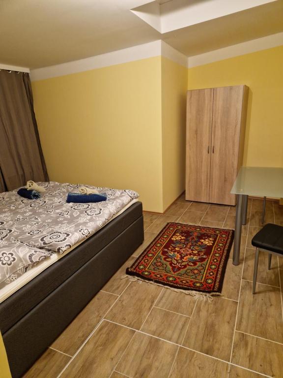 Postel nebo postele na pokoji v ubytování DrKarlRennerGarten