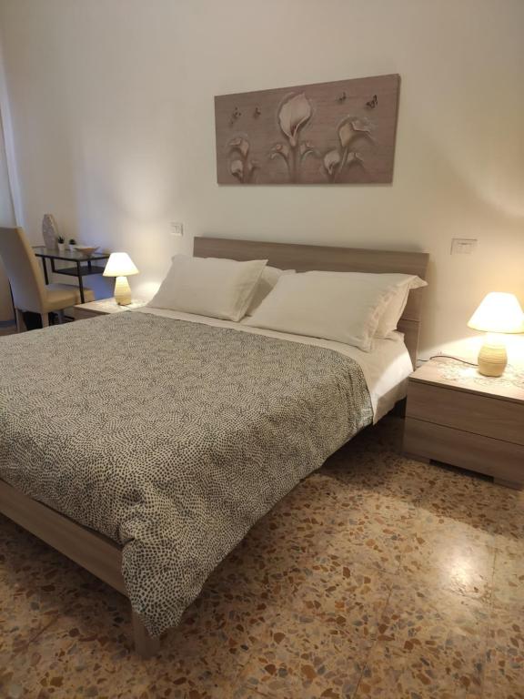 Postel nebo postele na pokoji v ubytování B&B 24 Maggio