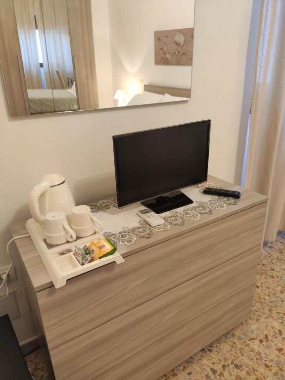 TV a/nebo společenská místnost v ubytování B&B 24 Maggio