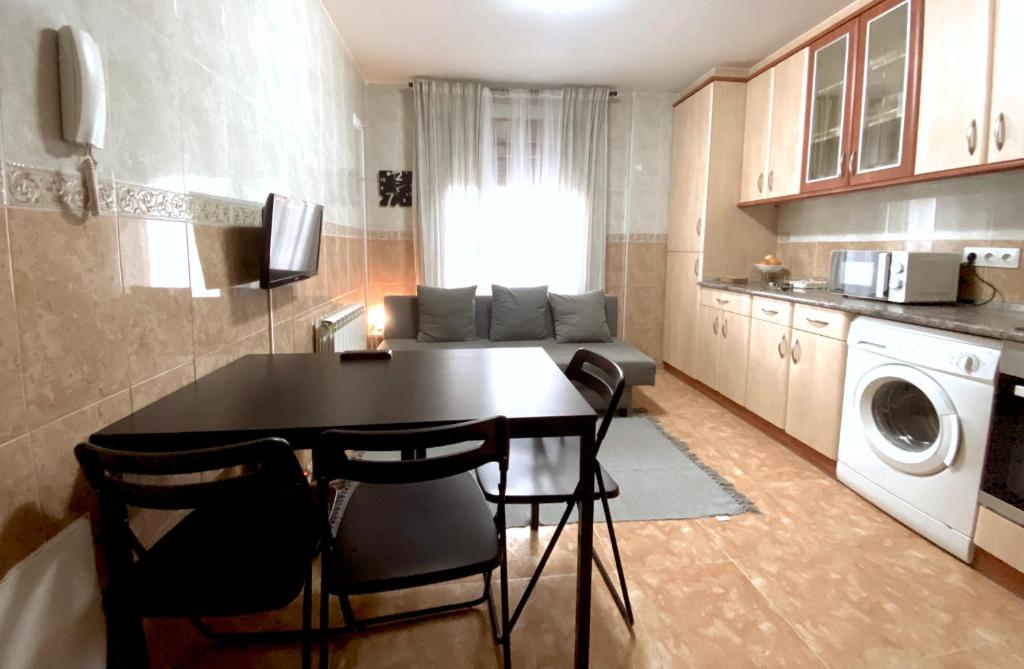 Kuchyň nebo kuchyňský kout v ubytování Apartamento del Rosario