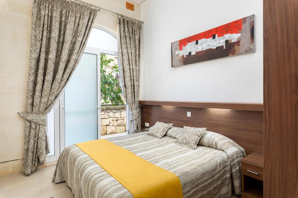 Postel nebo postele na pokoji v ubytování Quayside Apartments