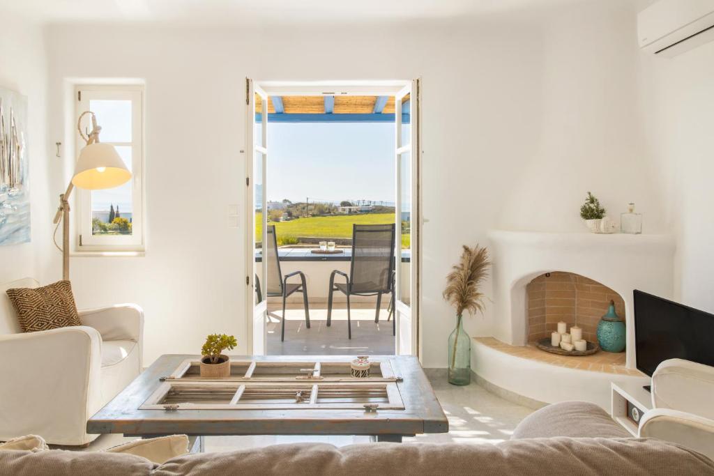 Posezení v ubytování White Cliff 4 - Cycladic Home