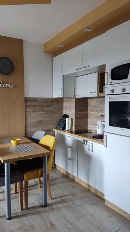 Kuchyň nebo kuchyňský kout v ubytování APARTMAN FEELING