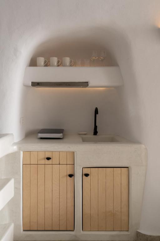 Kuchyň nebo kuchyňský kout v ubytování Nisó Cave Suites