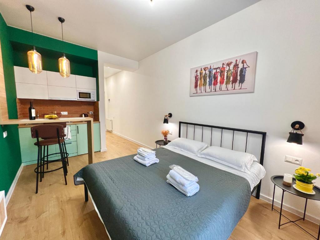 Postel nebo postele na pokoji v ubytování Ortachala Romantic Apartments