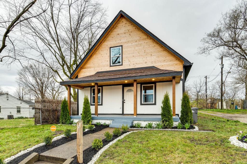 a small house with a gambrel roof at Modern Indianapolis Home Less Than 2 Mi to Downtown! in Indianapolis