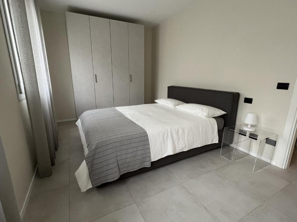 Giường trong phòng chung tại MyVilla - Ivrea via Jervis 22b