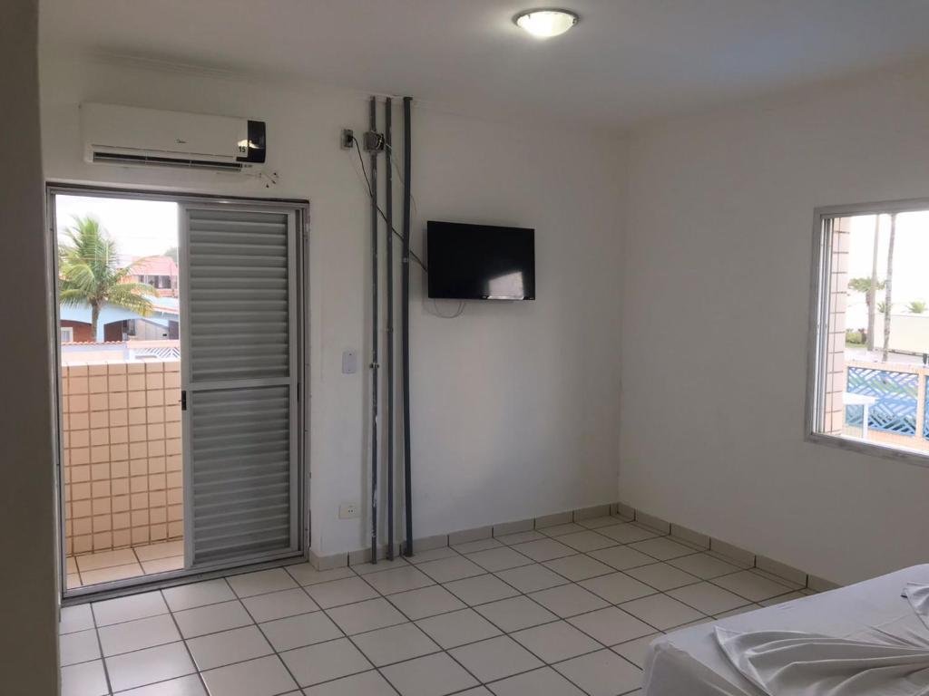 Cama ou camas em um quarto em Pousada dos Eletricitarios