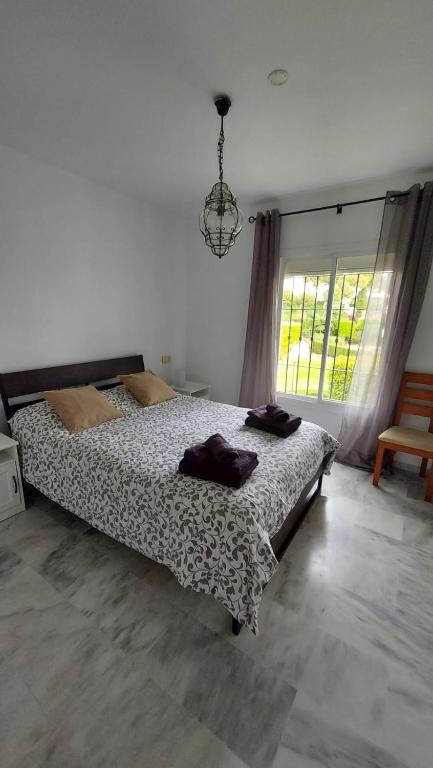 Posteľ alebo postele v izbe v ubytovaní Piso Miraflores
