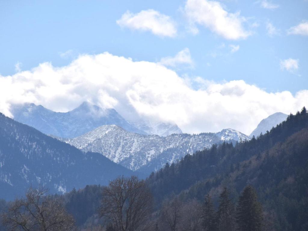 a view of a mountain range with snow capped mountains at Holiday home Karwendel in Füssen